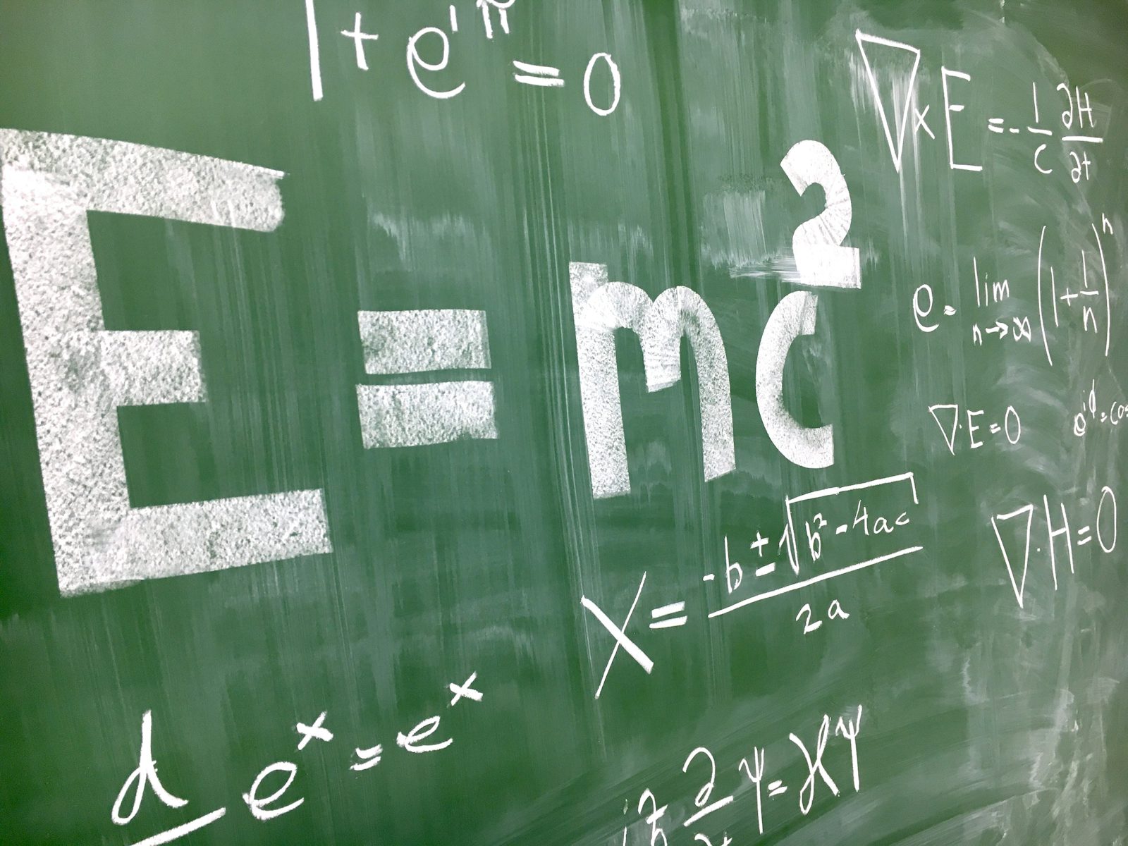 Math equations on chalkboard
